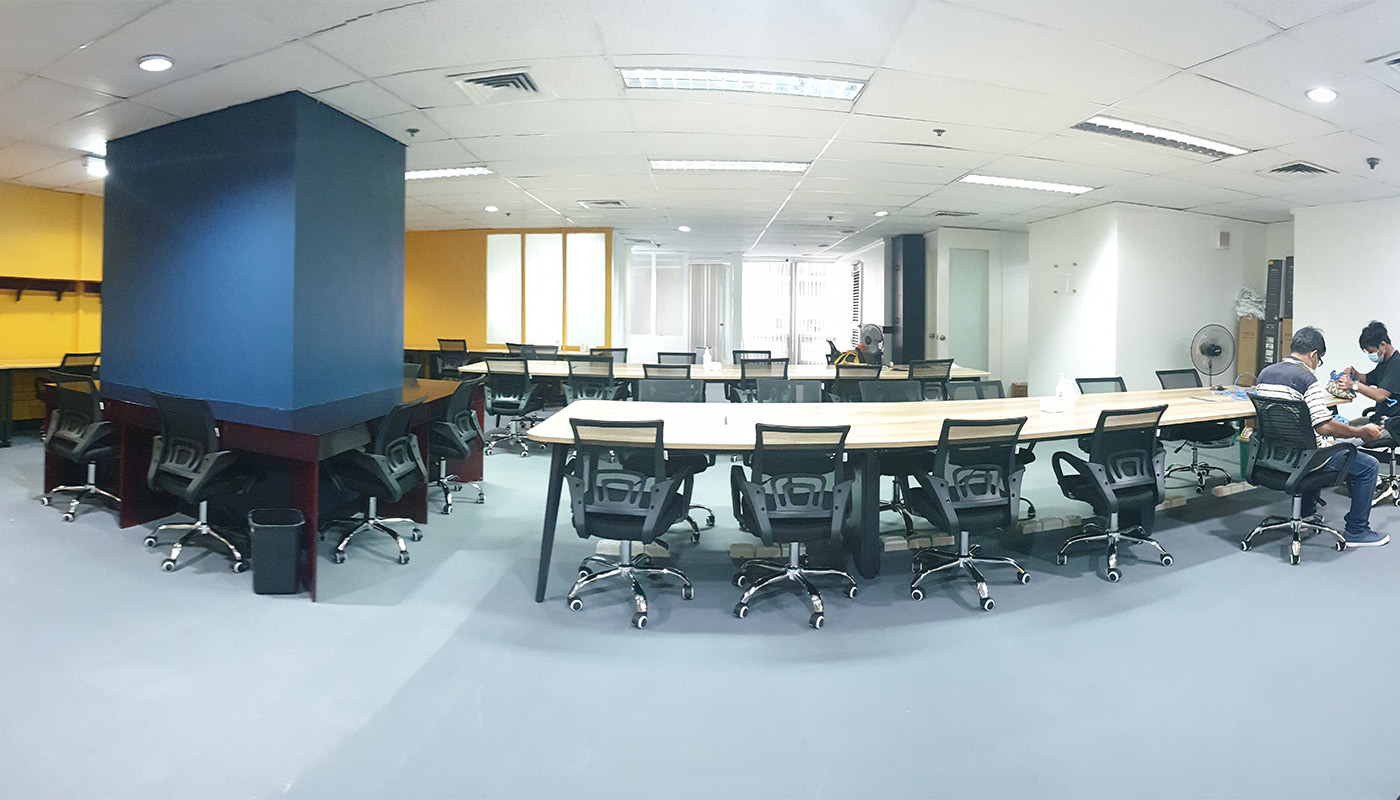 Conducive office space with swivel office chairs at our FirstCom Solutions Manila office