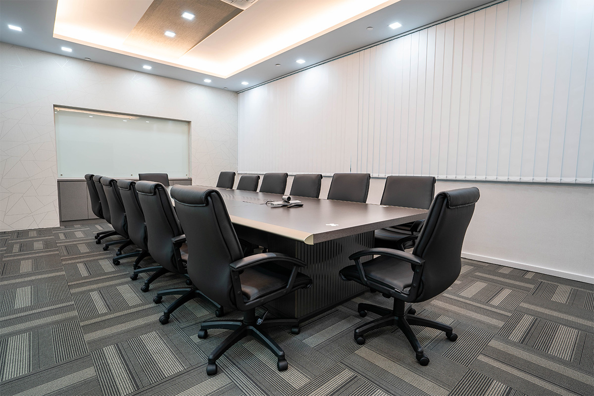 Spacious conference room equipped with 14 swivel office chairs, conducive and productive for meetings